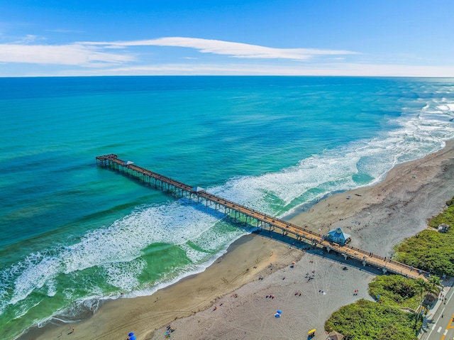 drone / aerial view with a view of the beach and a water view