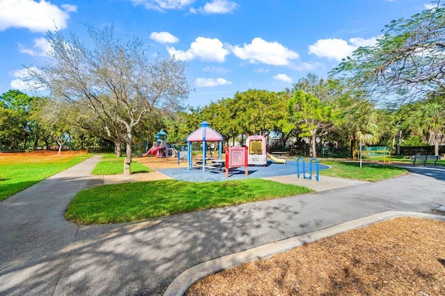 community play area with a lawn