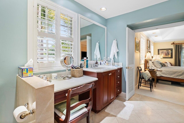 bathroom with tile patterned floors and vanity