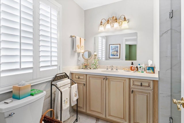 bathroom with vanity and toilet