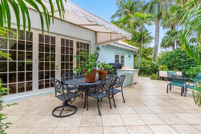 view of patio featuring french doors