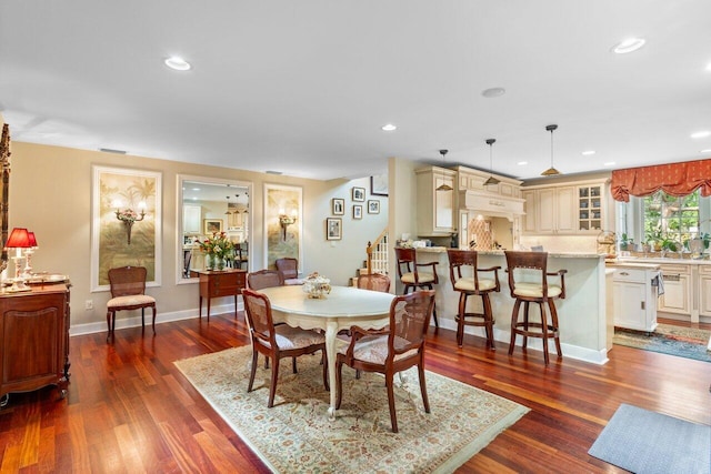 dining space featuring dark hardwood / wood-style flooring