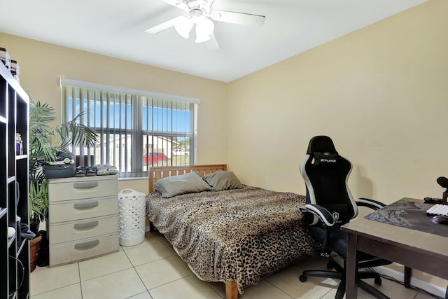 bedroom with light tile patterned floors and ceiling fan