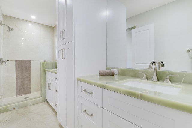 full bathroom with a shower stall, vanity, and recessed lighting