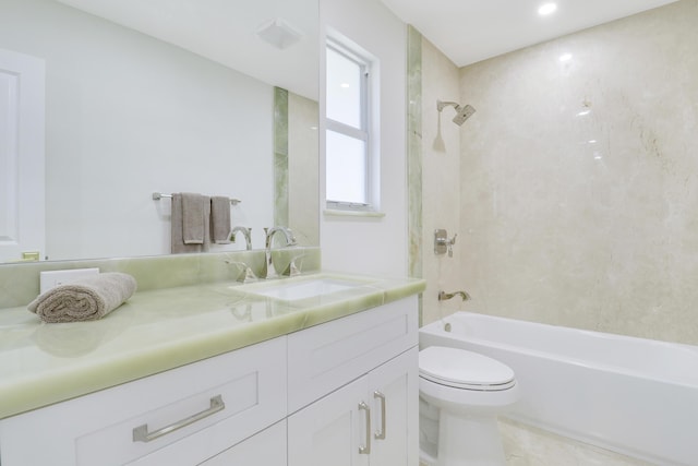 bathroom with toilet, shower / tub combination, and vanity