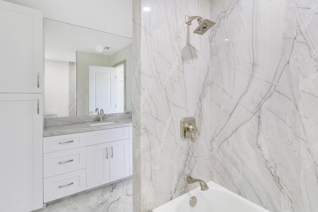 bathroom with shower / washtub combination and vanity