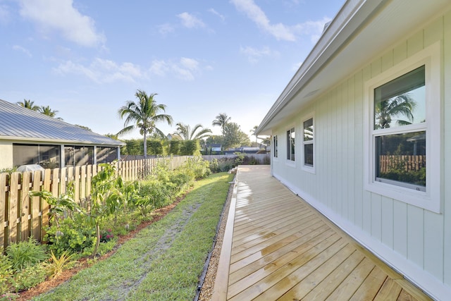 view of yard with a deck and a fenced backyard