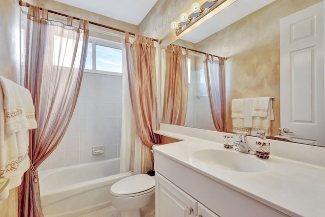 full bathroom featuring vanity, shower / bath combination with curtain, and toilet