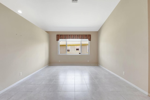 8430 Marsala Way, Boynton Beach, FL 33472 - empty room with light tile patterned flooring and baseboards