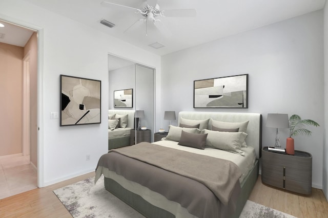 8430 Marsala Way, Boynton Beach, FL 33472 - bedroom with a closet, wood finished floors, ceiling fan, and baseboards