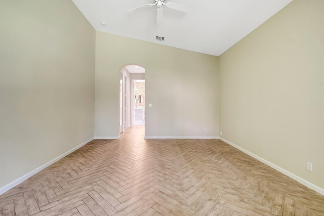 8430 Marsala Way, Boynton Beach, FL 33472 - spare room featuring arched walkways, a ceiling fan, and baseboards