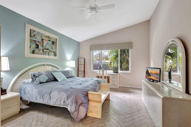 bedroom featuring ceiling fan, vaulted ceiling, and light parquet floors