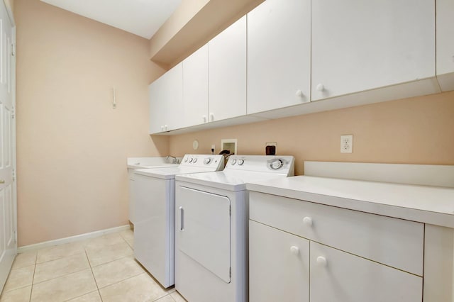 8430 Marsala Way, Boynton Beach, FL 33472 - laundry room featuring cabinet space, separate washer and dryer, baseboards, and light tile patterned flooring