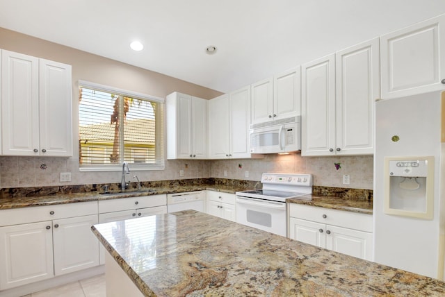 8430 Marsala Way, Boynton Beach, FL 33472 - kitchen with white appliances, a sink, stone countertops, tasteful backsplash, and recessed lighting