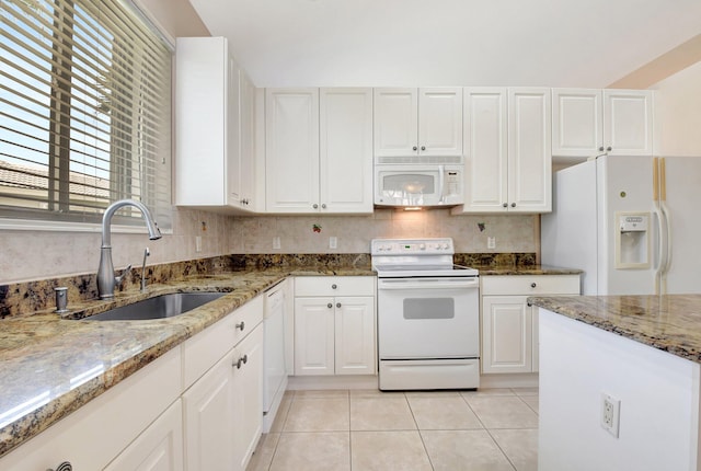 8430 Marsala Way, Boynton Beach, FL 33472 - kitchen featuring white appliances, a sink, white cabinetry, light tile patterned flooring, and light stone countertops