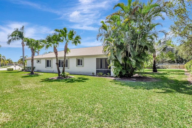 8430 Marsala Way, Boynton Beach, FL 33472 - rear view of house with stucco siding and a tile roof