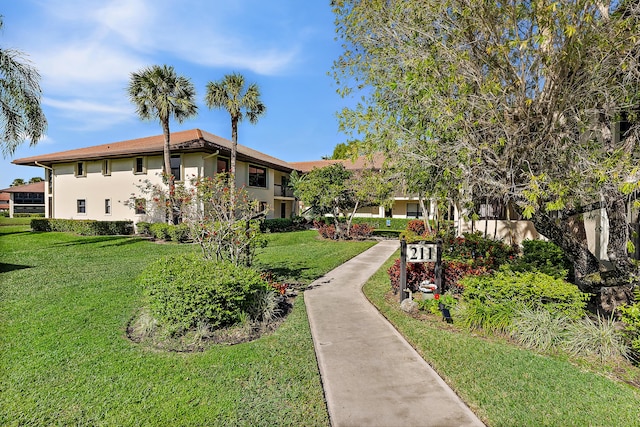 exterior space featuring a lawn