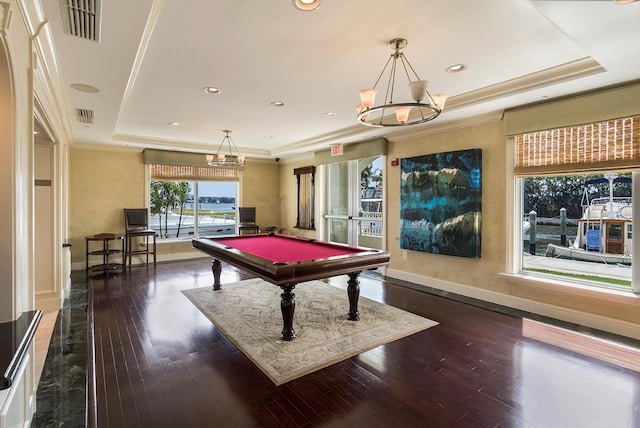 playroom with crown molding, billiards, dark hardwood / wood-style flooring, a raised ceiling, and a chandelier