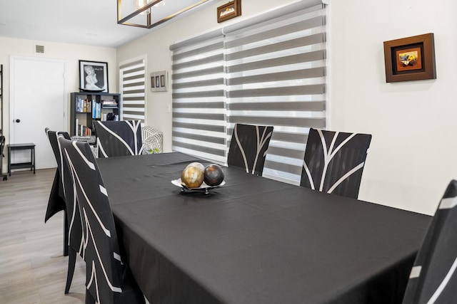 dining area featuring light hardwood / wood-style floors