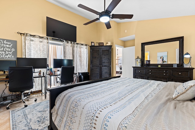 bedroom featuring vaulted ceiling and ceiling fan