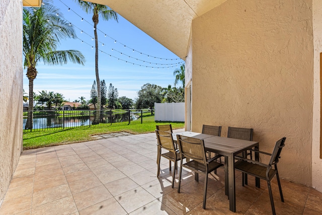 view of patio / terrace with a water view