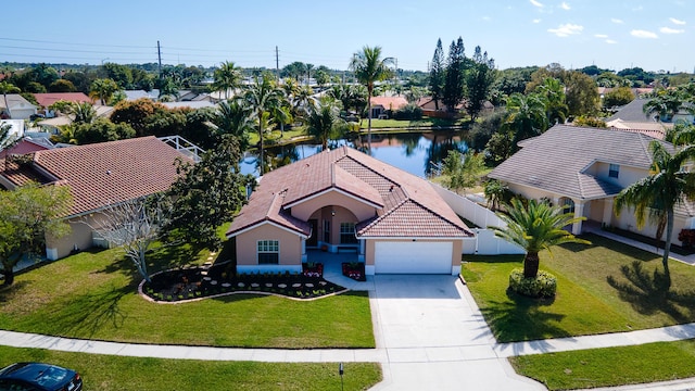 drone / aerial view featuring a water view