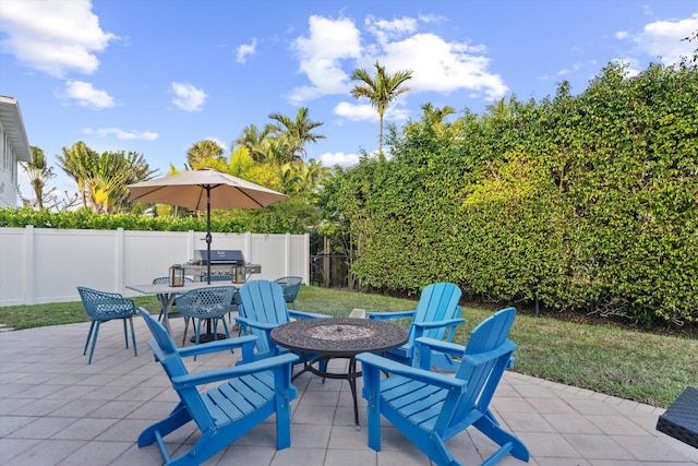 view of patio with a grill