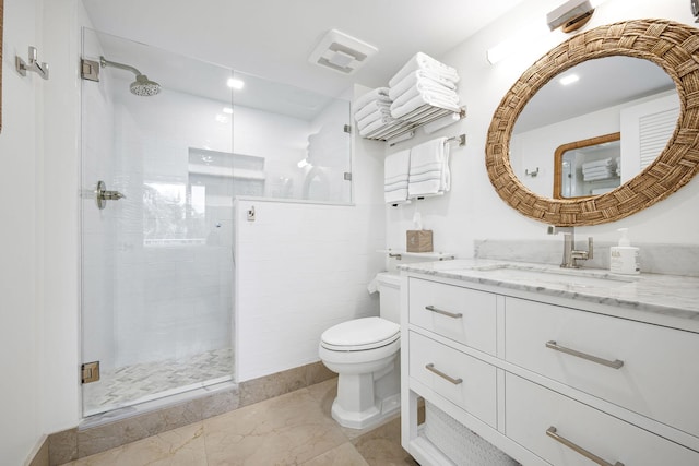 bathroom with a stall shower, visible vents, toilet, marble finish floor, and vanity