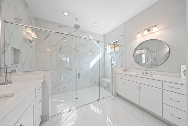 bathroom with vanity and walk in shower