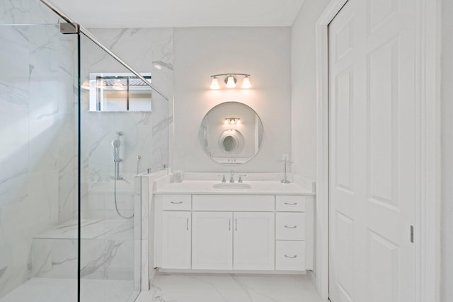 bathroom featuring vanity and tiled shower