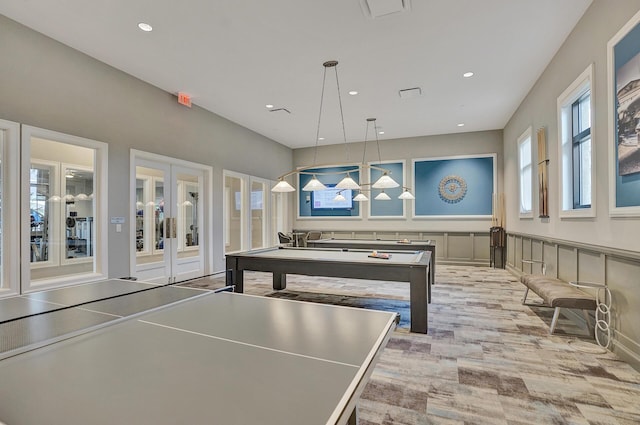 game room with pool table and french doors