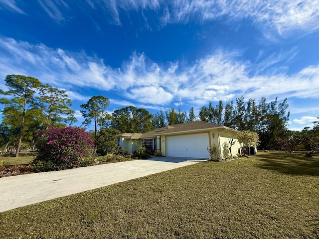 ranch-style home featuring a garage and a front yard