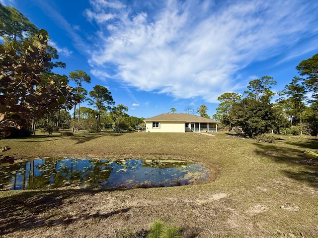 view of yard with a water view