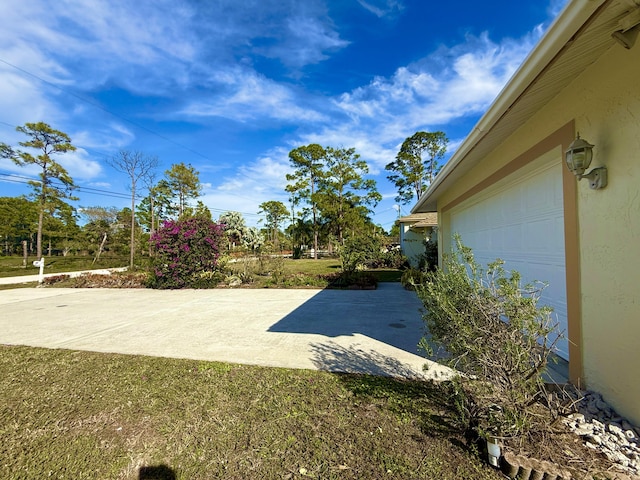 view of patio with a garage