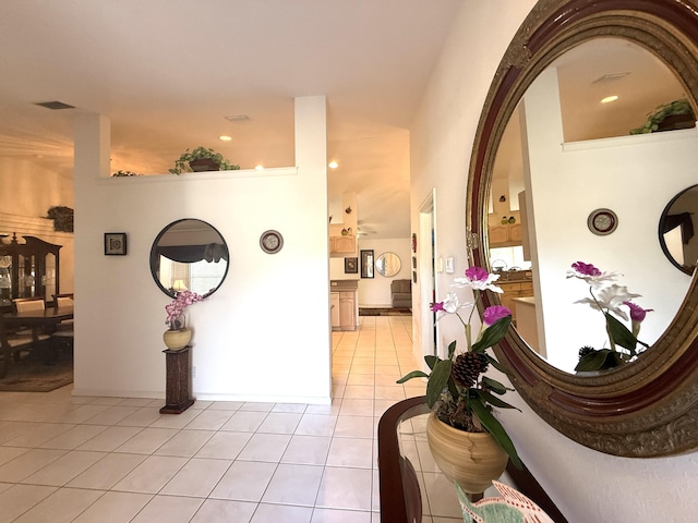 hallway with light tile patterned floors