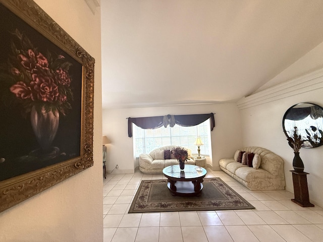 living room with lofted ceiling and light tile patterned floors