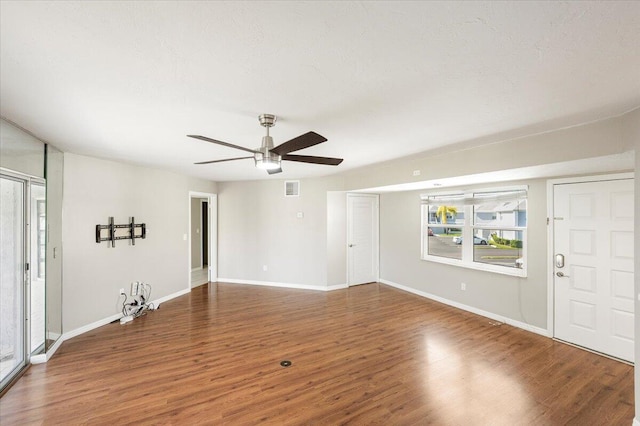 interior space featuring hardwood / wood-style flooring and ceiling fan