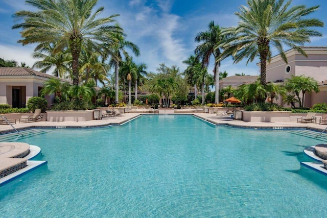 community pool with a patio