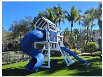 view of jungle gym featuring a lawn