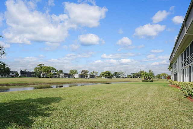 view of yard with a water view