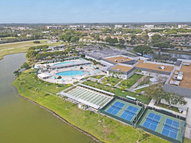 birds eye view of property with a water view