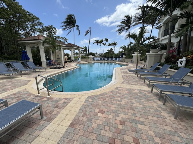 view of pool with a gazebo and a patio area