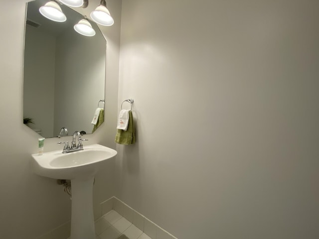 bathroom with tile patterned flooring