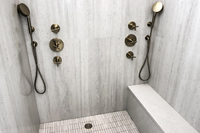 bathroom with walk in shower and tile patterned flooring