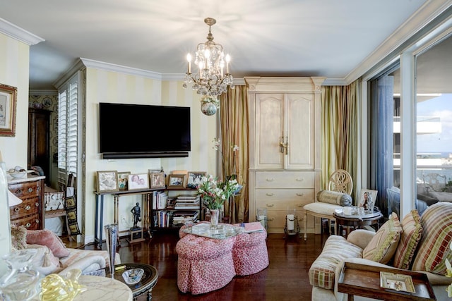 living room with ornamental molding, a notable chandelier, and dark hardwood / wood-style flooring