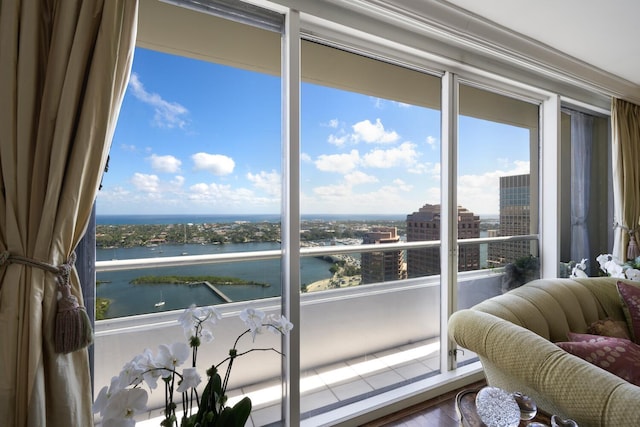 sunroom with a water view