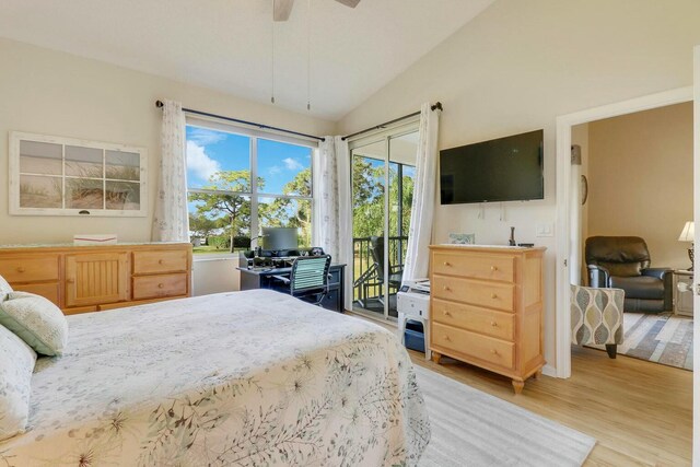 bedroom featuring lofted ceiling and wood-type flooring