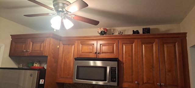 kitchen with fridge and ceiling fan