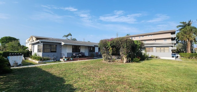 view of front of property with a front lawn