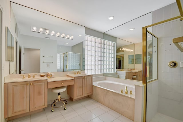 bathroom featuring tile patterned flooring, plus walk in shower, and vanity